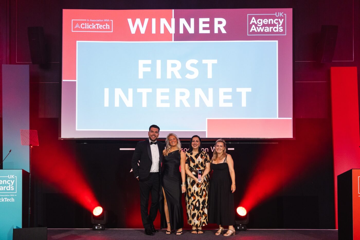 first internet team on stage receiving agency of the year award in london